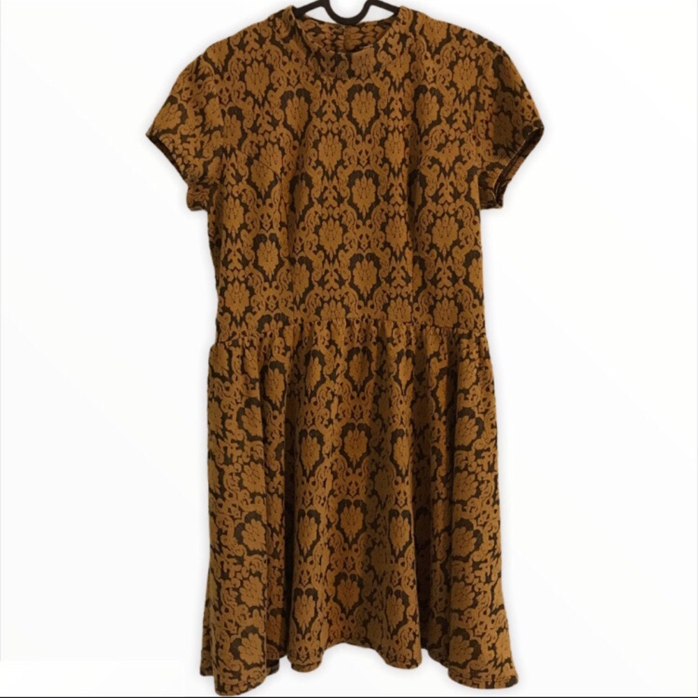Gold and black baroque print dress.